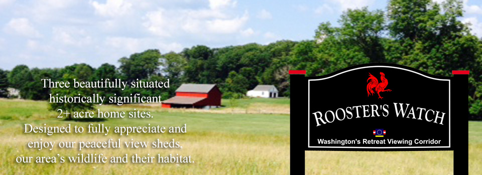 A large field with a barn and house in the distance. Rooster's Watch Sign. 3 beautifully situated historically significant 2+ acre home sites. Designed to fully appreciate and enjoy our peaceful view sheds, our area's wildlife and their habitat.